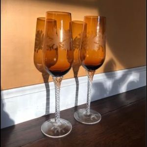 Pair Jaguar etched amber maple art glass champagne flutes
